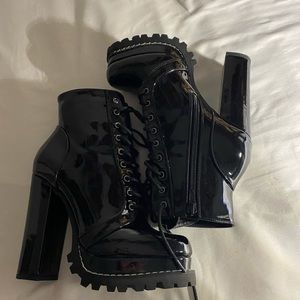 Akira’s black boot